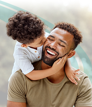 Son hugging dad